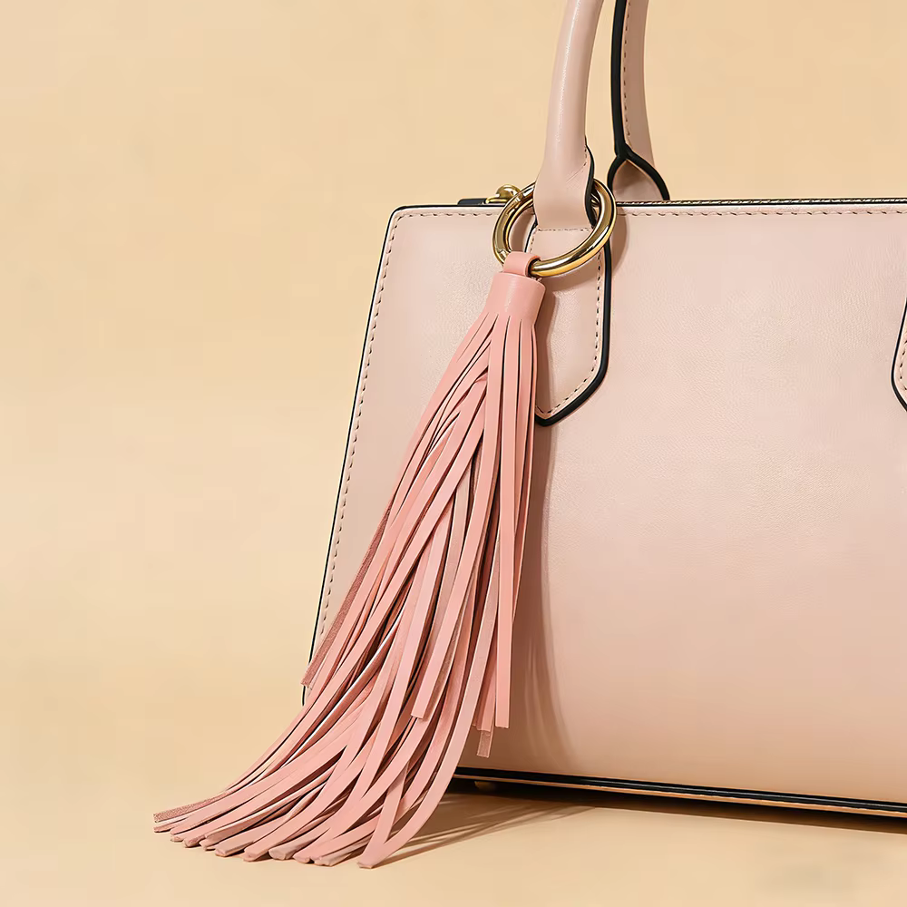 Porte-clés de luxe en cuir souple avec pompon, élégant pendentif de sac, accessoire de clé de voitur