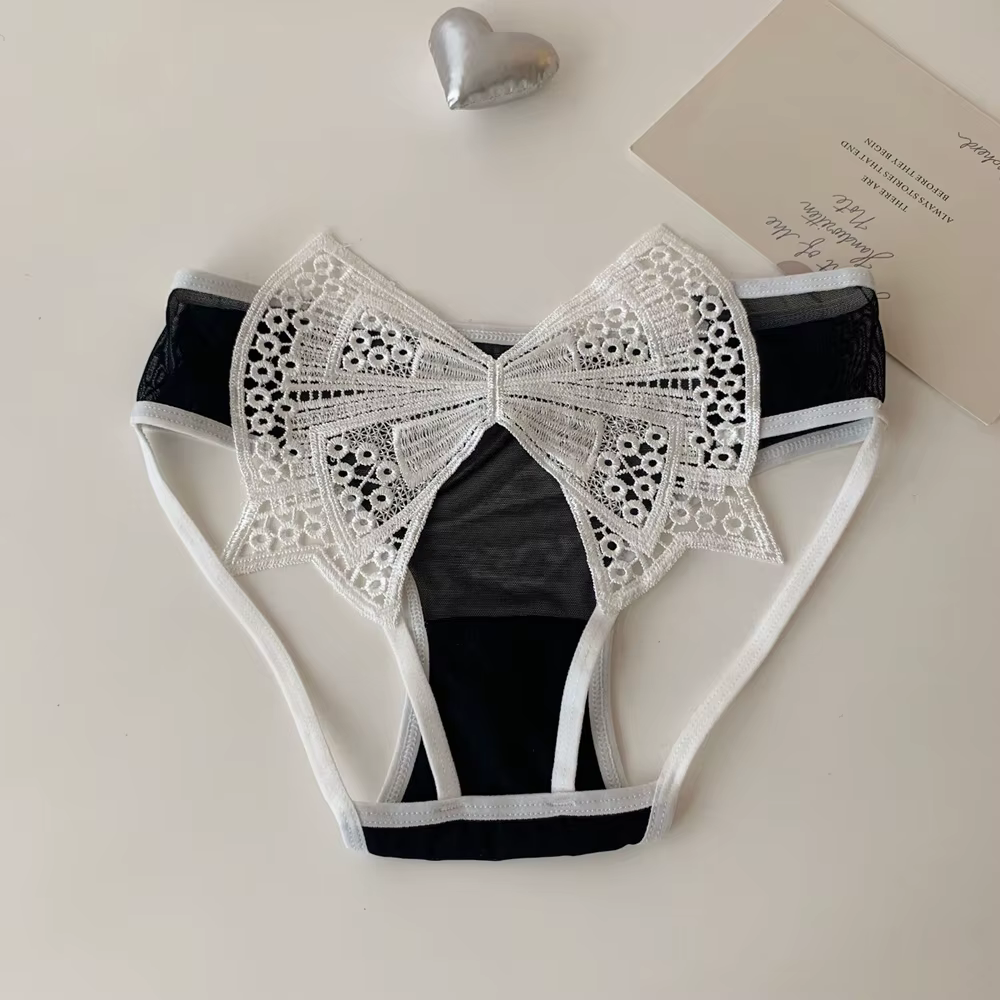 Culotte femme noeud papillon pour les fesses creux Lingerie Sexy transparent creux sous-vêtements en