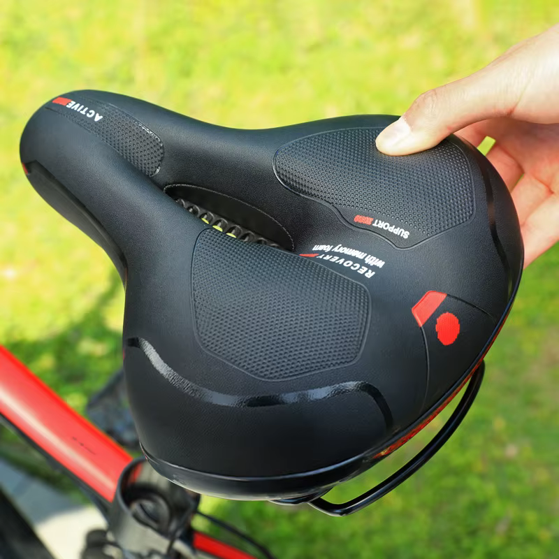 Selle de vélo creuse réfléchissante absorbant les chocs, respirante, imperméable, large siège de vél