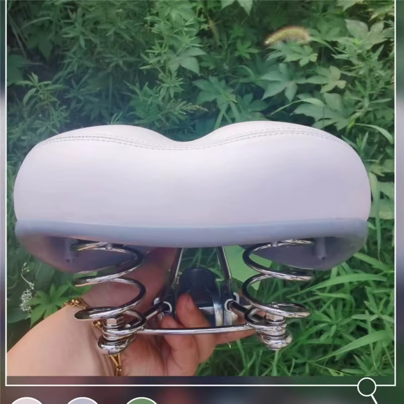 Selle de vélo blanche avec ressort