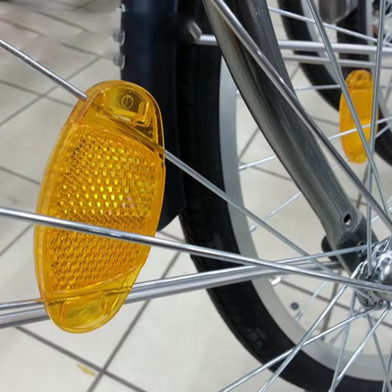 Réflecteur de sécurité pour rayons de vélo de route