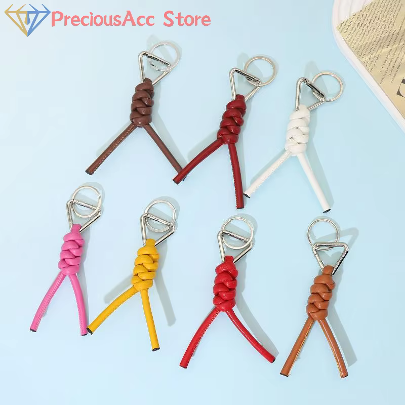 Porte-clés en cuir tissé, outil de Camping en plein air, porte-clés haut de gamme, pendentif de clé Automobile, accessoire de sac suspendu