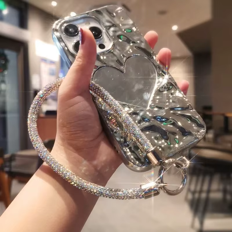 Lanière de téléphone de luxe entièrement sertie de diamants avec clip métallique, chaîne courte universelle, accessoire de poignet pour téléphone portable