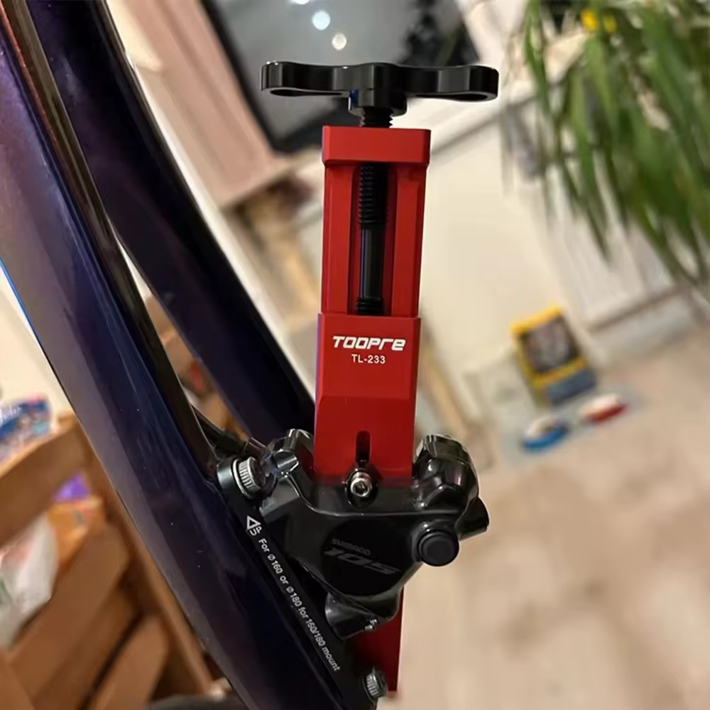 Outil de réinitialisation de piston de vélo
