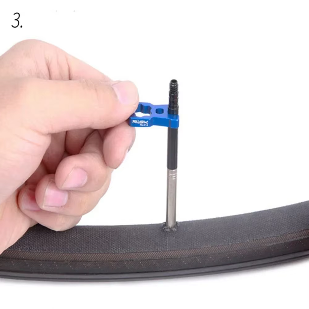 Outil de réparation de valve de vélo portable 4 en 1