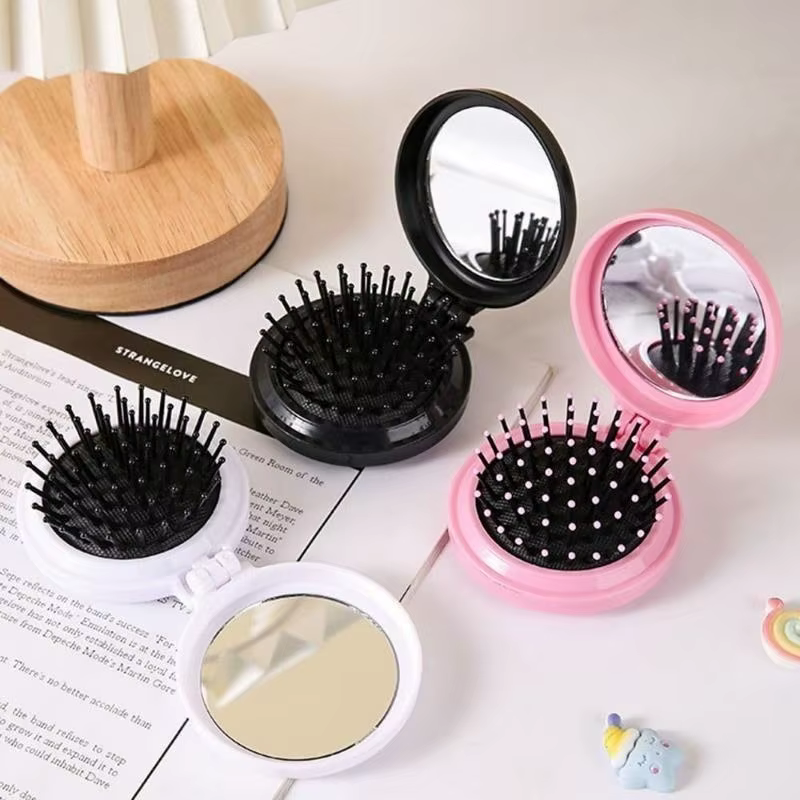 Mini brosse à cheveux ronde pliable pour femmes et filles, brosses de voyage pour cheveux, peigne de poche, brosse à cheveux avec miroir.