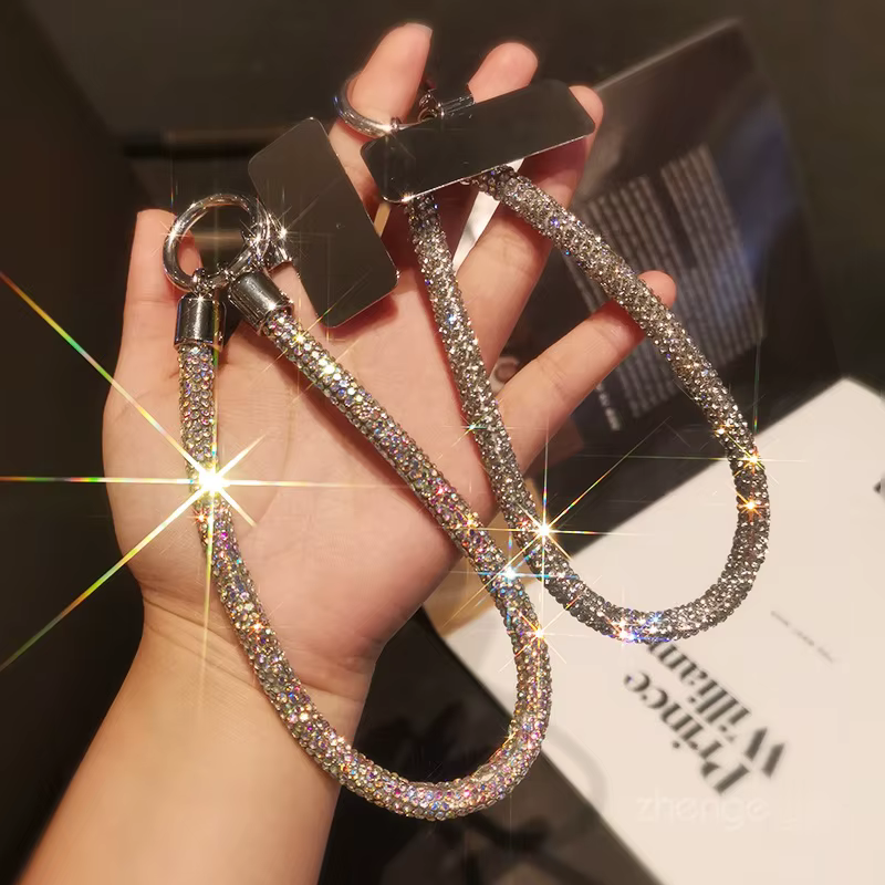 Lanière de téléphone de luxe entièrement sertie de diamants avec clip métallique, chaîne courte universelle, accessoire de poignet pour téléphone portable