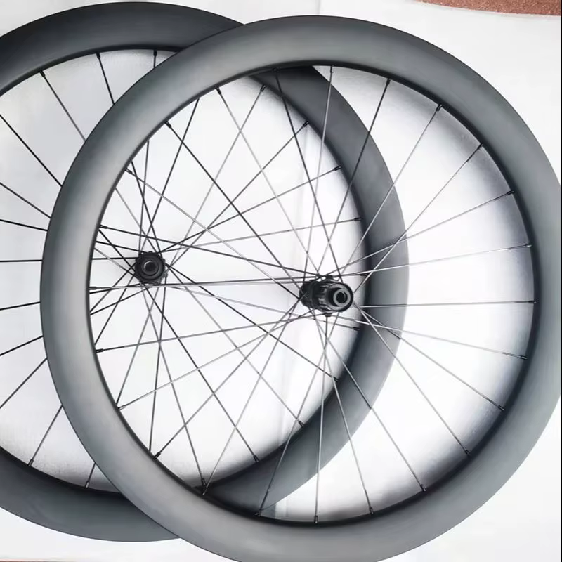 Jeu de roues de vélo de route en carbone Clincher pour disque
